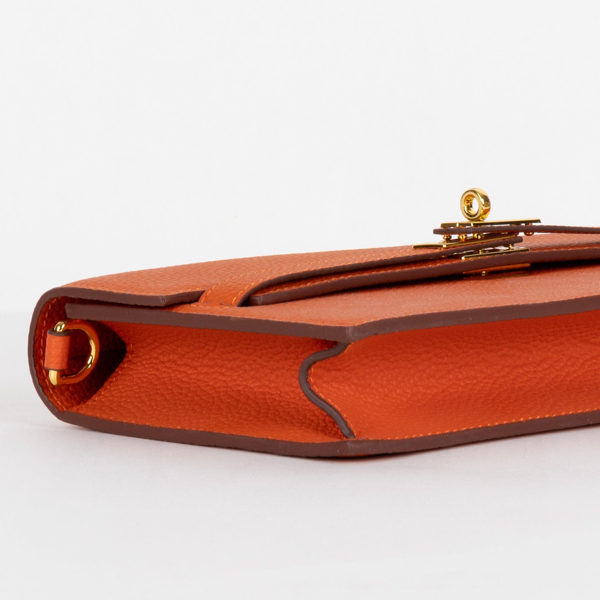 Embrayage en cuir camélia 24 - orange