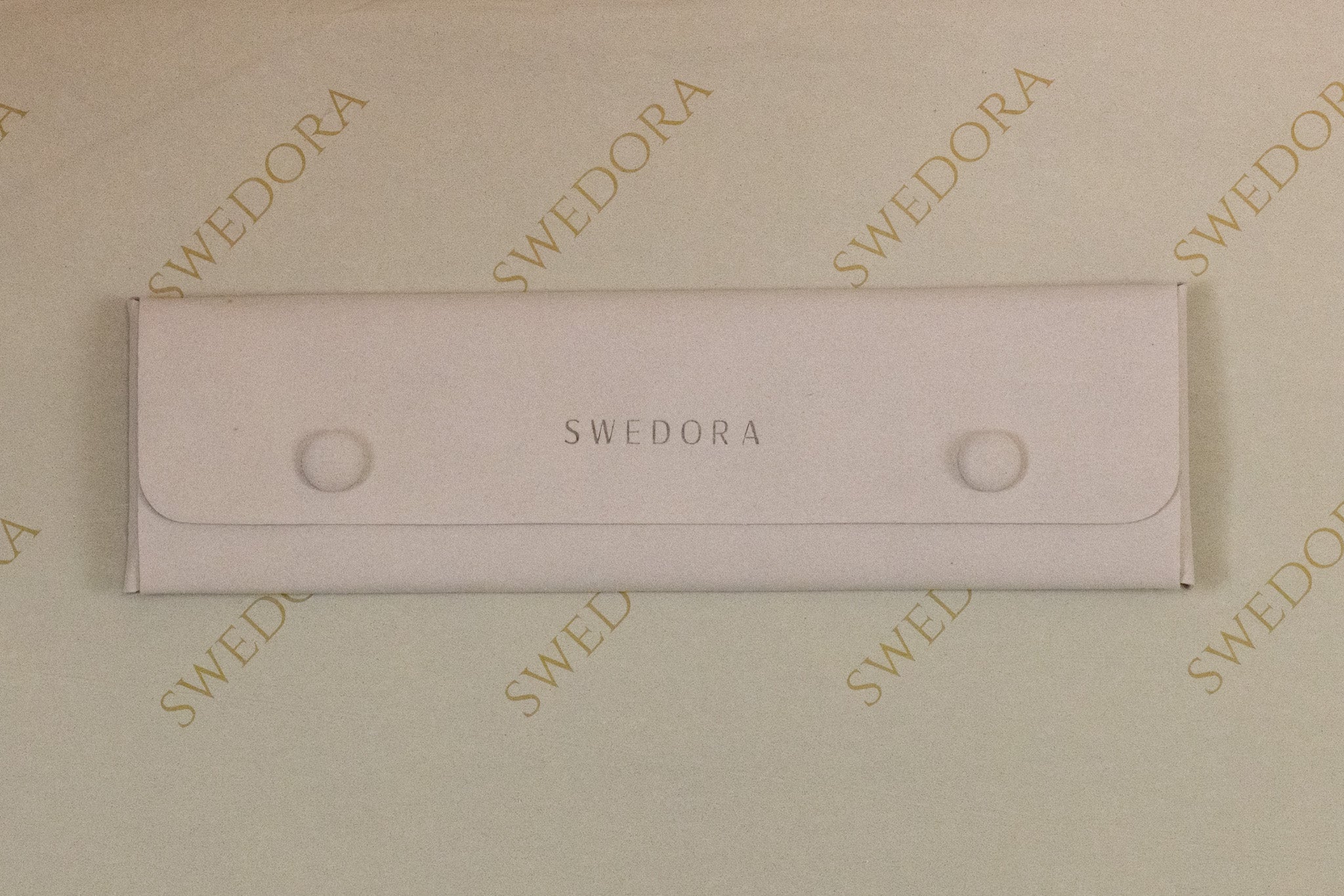 Smykkerpose til halskjeder og armbånd grå